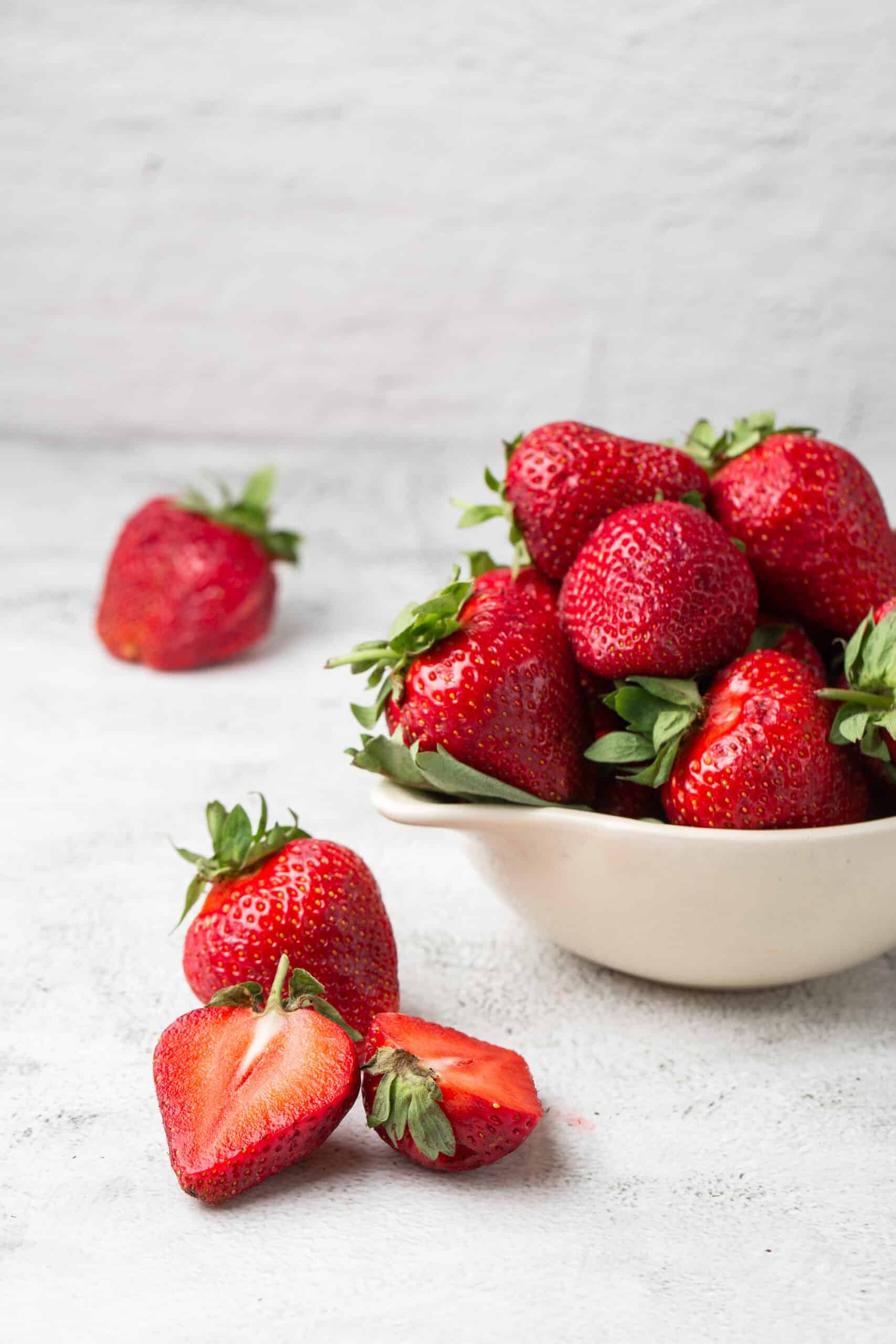 Fresh,Strawberries,In,A,Bowl,On,Marble,White,Table.,Fresh